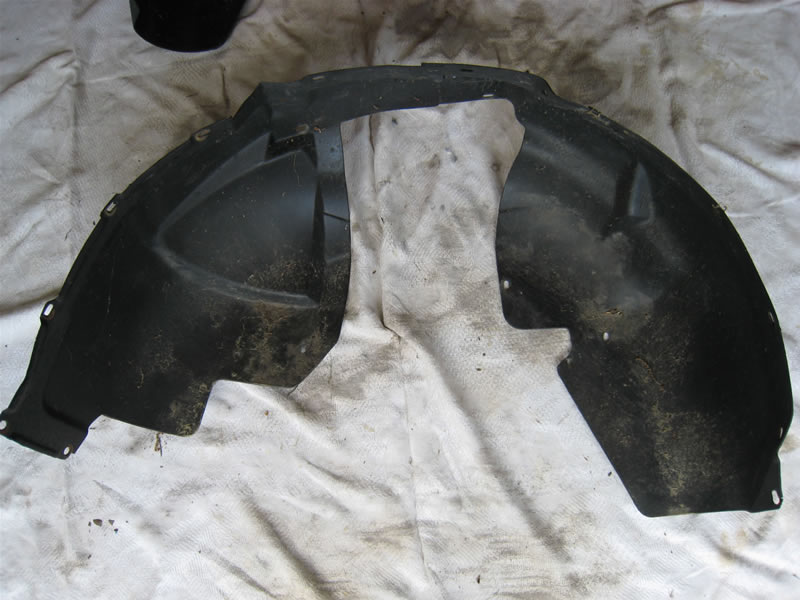 Front wheel well liner