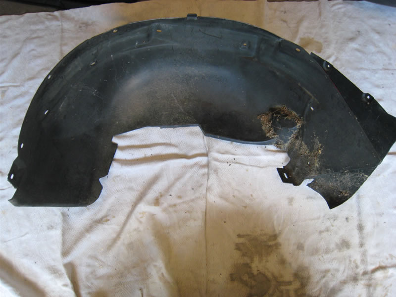 Rear wheel well liner